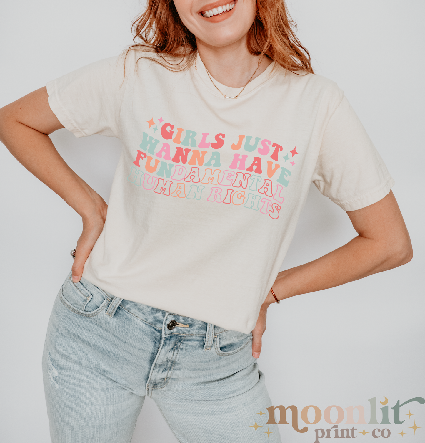 a woman wearing a t - shirt that says girls just wanna to have fun and