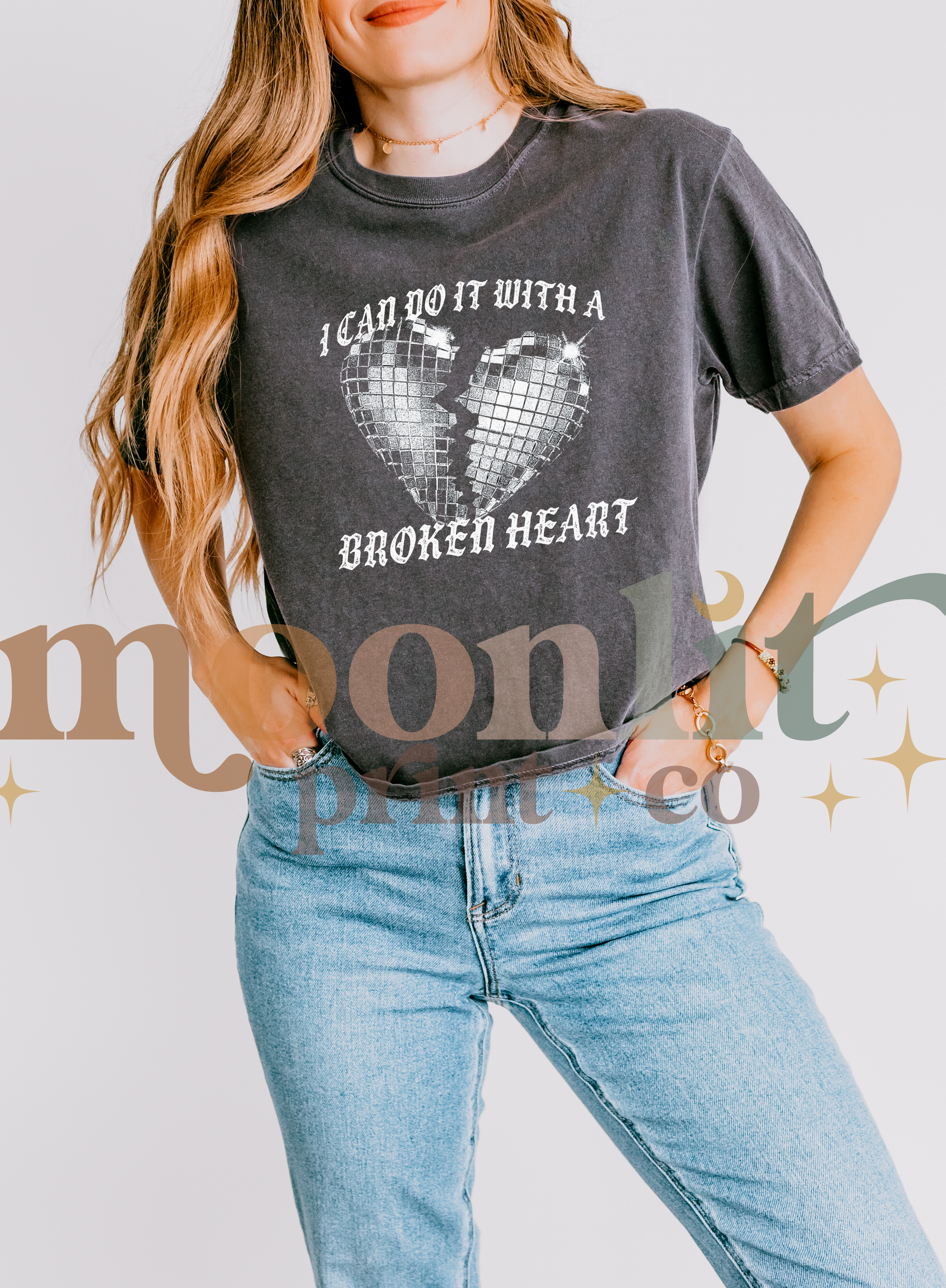 a woman wearing a t - shirt that says i can do it with a broken