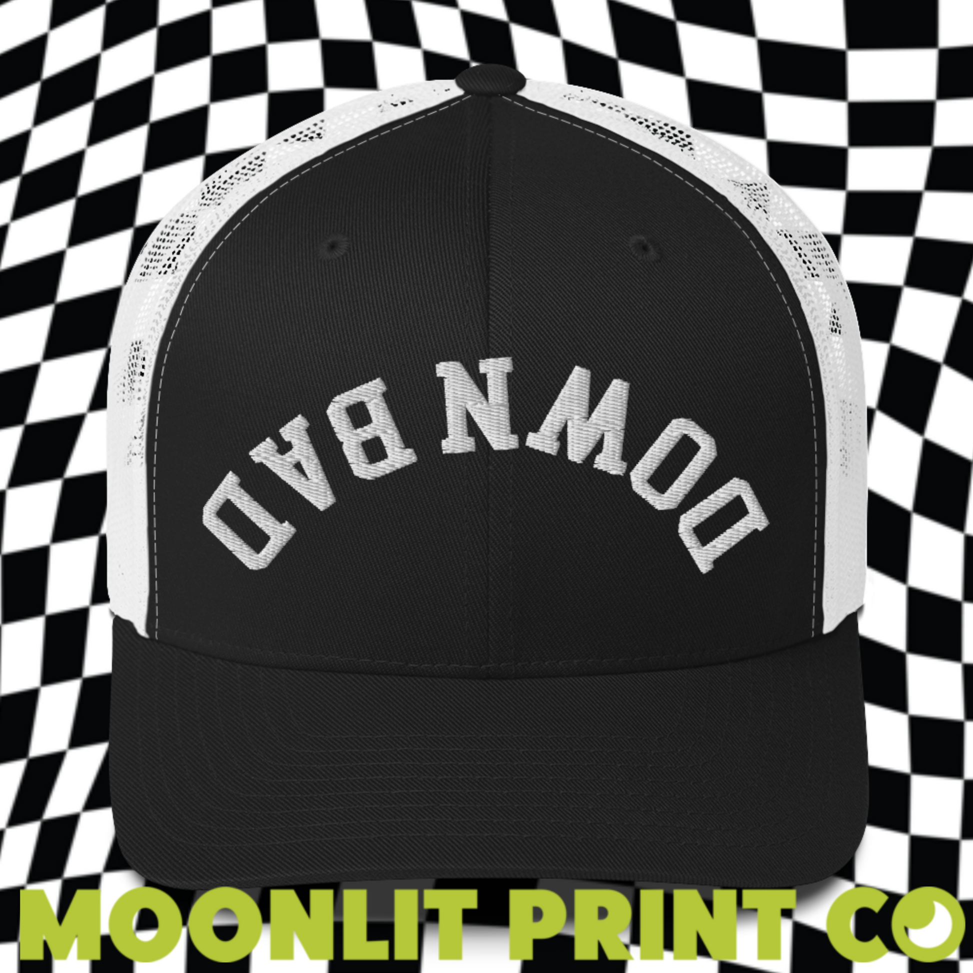 a black and white trucker hat with the words moonlit print on it