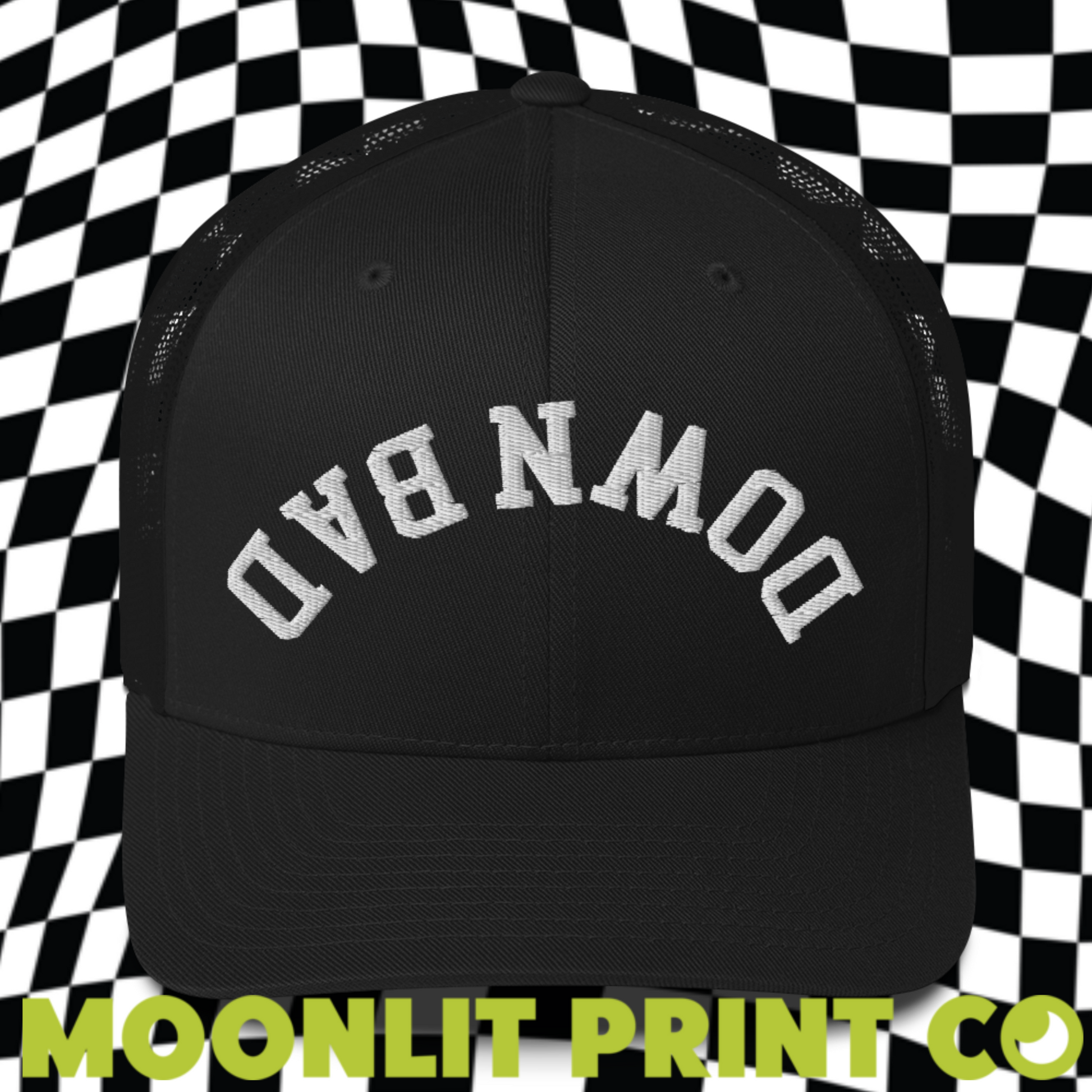 a black and white trucker hat with the words moonlit print on it