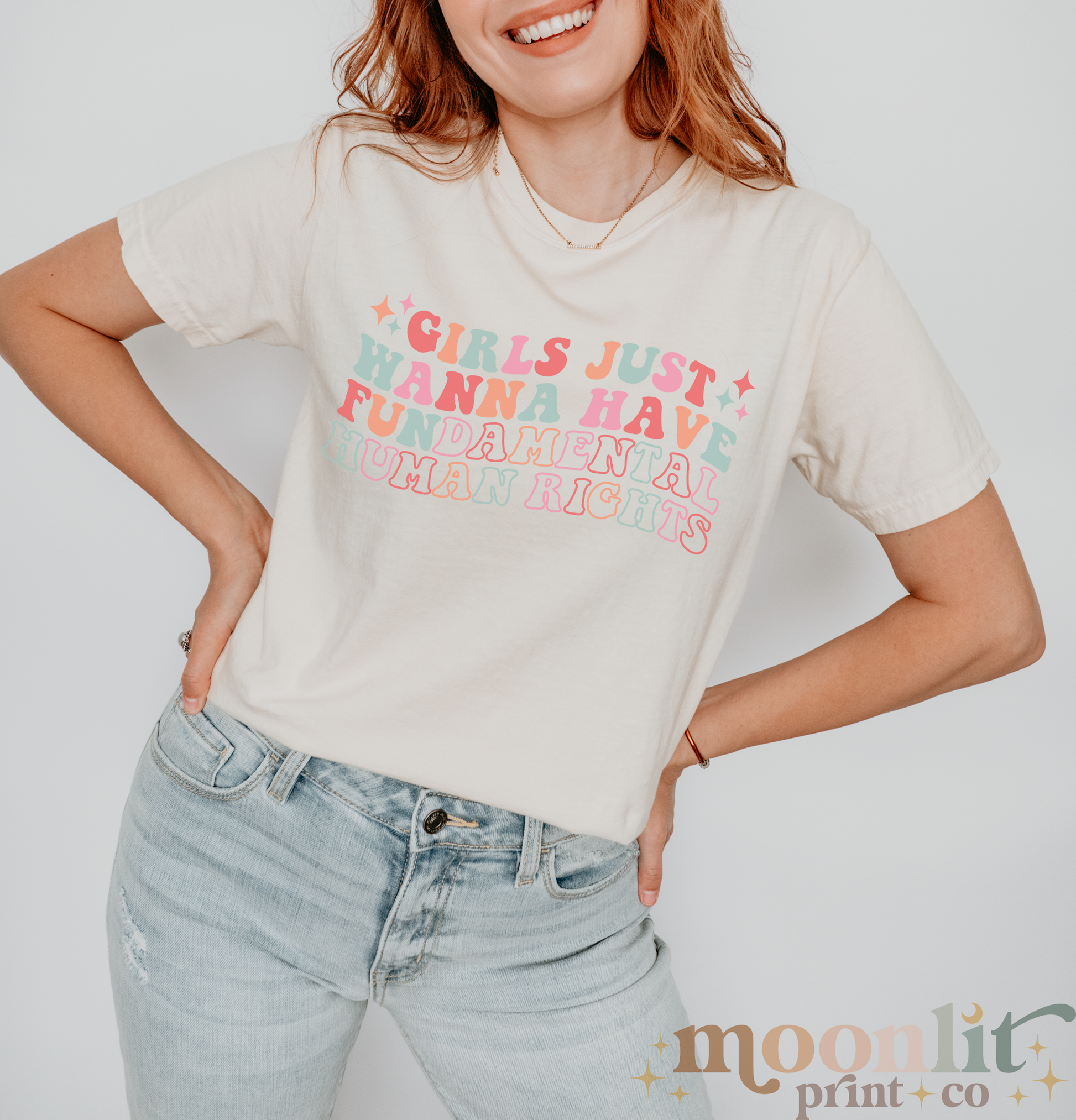 a woman wearing a t - shirt that says girls just wanna to have fun and
