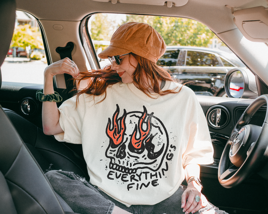 a woman sitting in the back seat of a car